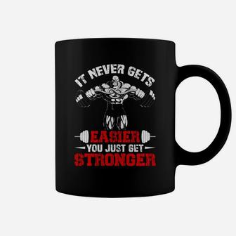 It Never Gets Easier You Just Get Stronger Gym Lovers Coffee Mug | Crazezy