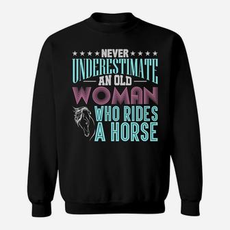Never Underestimate An Old Woman Who Rides A Horse Sweatshirt Sweatshirt | Crazezy