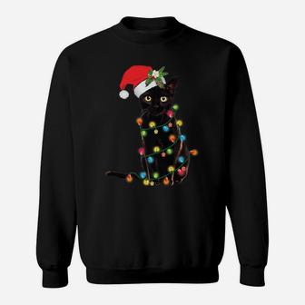 Santa Black Cat Wrapped Up In Christmas Tree Lights Holiday Sweatshirt | Crazezy