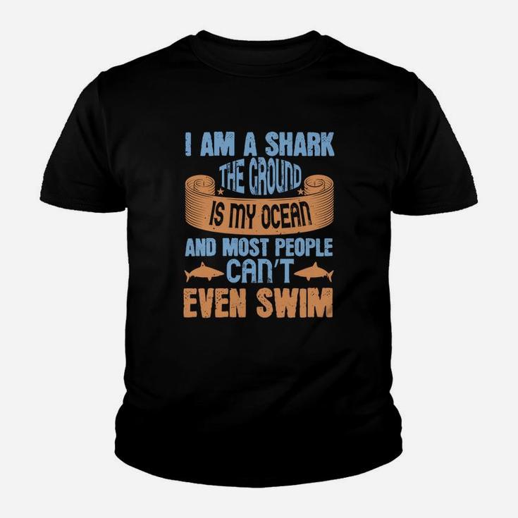 I Am A Shark The Ground Is My Ocean And Most People Can’t Even Swim Youth T-shirt
